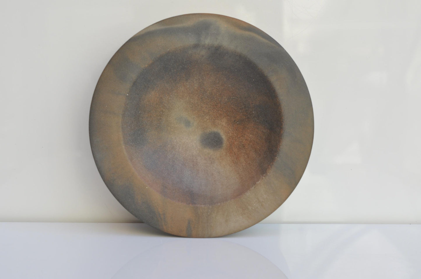 Minimalist concrete bowl used as key holder