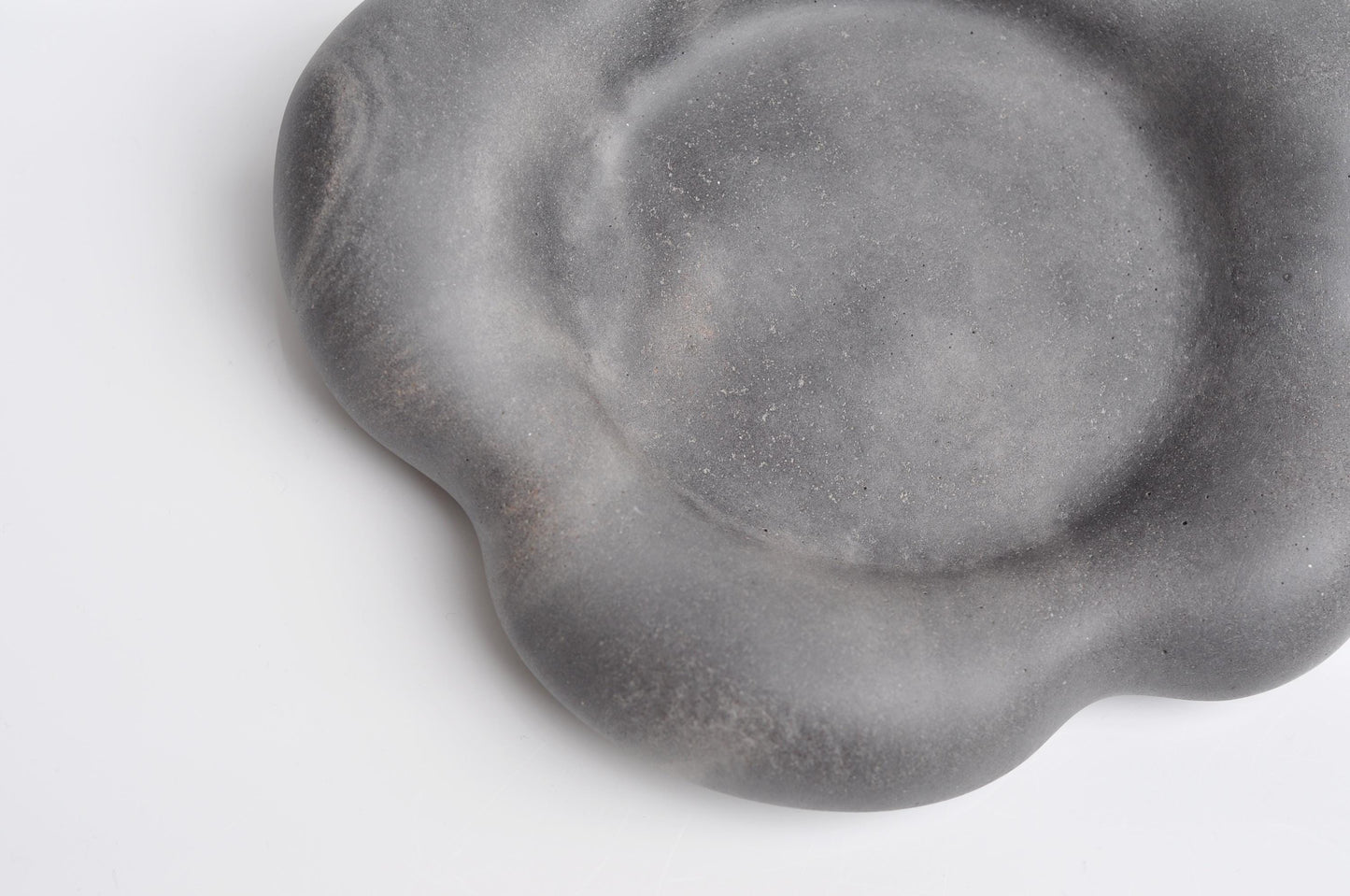 Close-up of textured handmade concrete tray