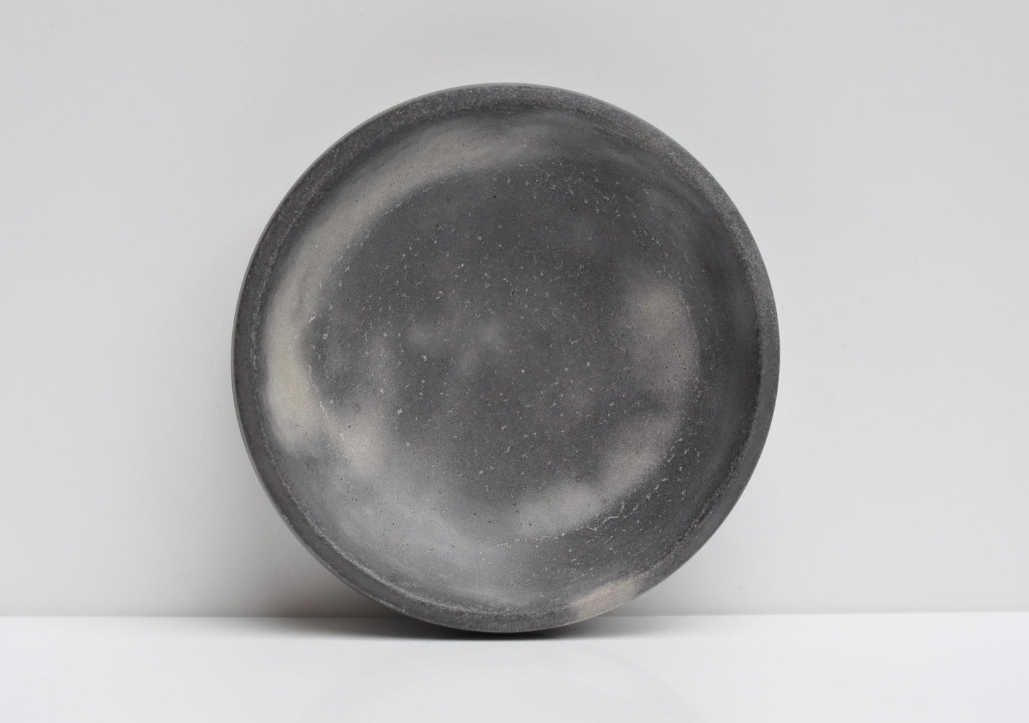 Close-up texture of grey cement bowl