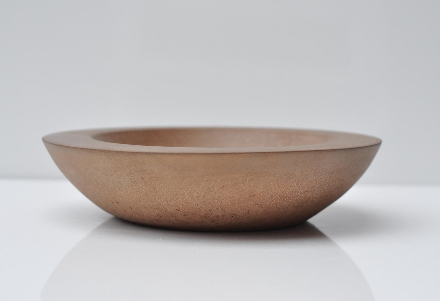 Shallow handmade bowl with matte finish