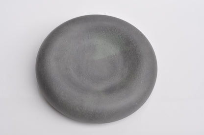 Studio shot of handmade minimalist concrete key bowl