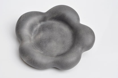 Minimalist flower concrete tray styled in modern home