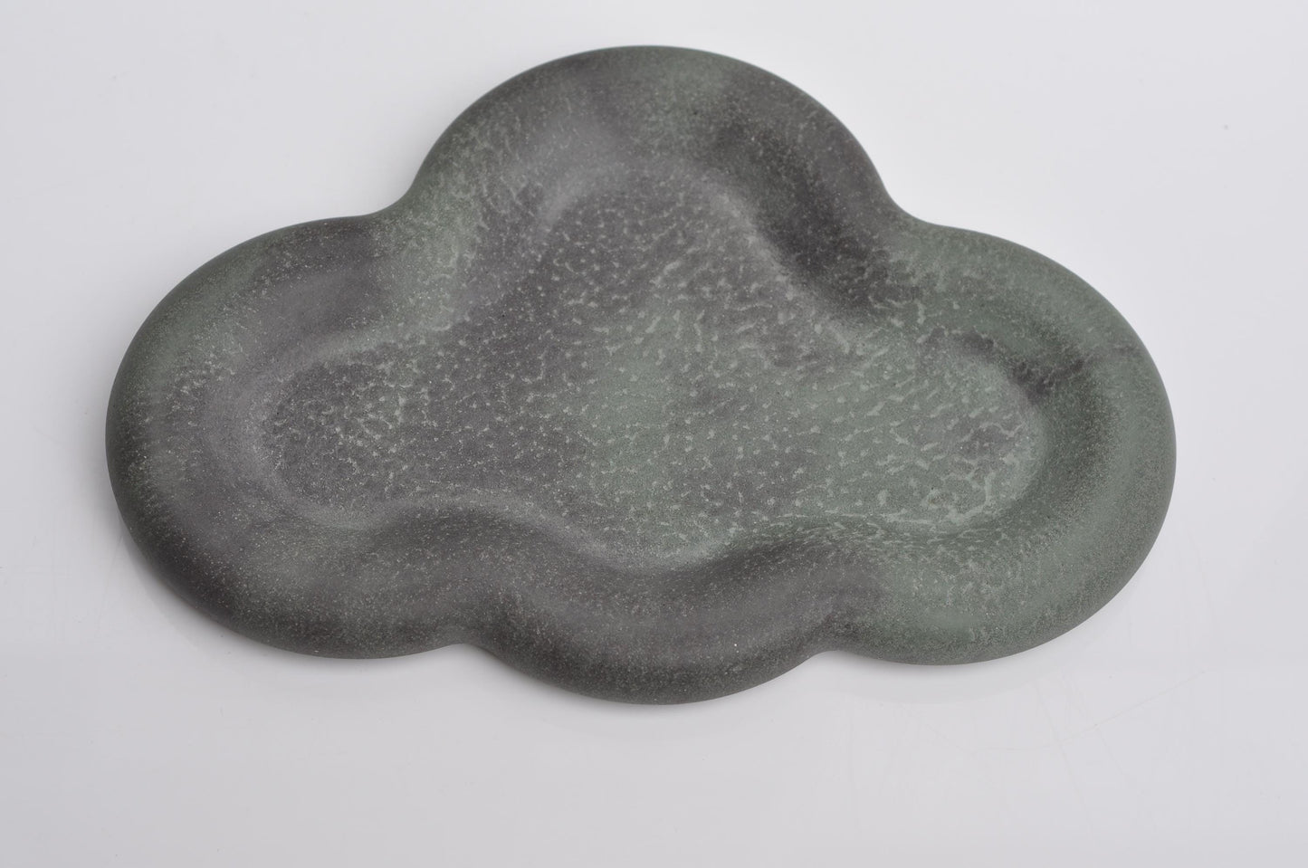 Contemporary concrete tray styled with décor items