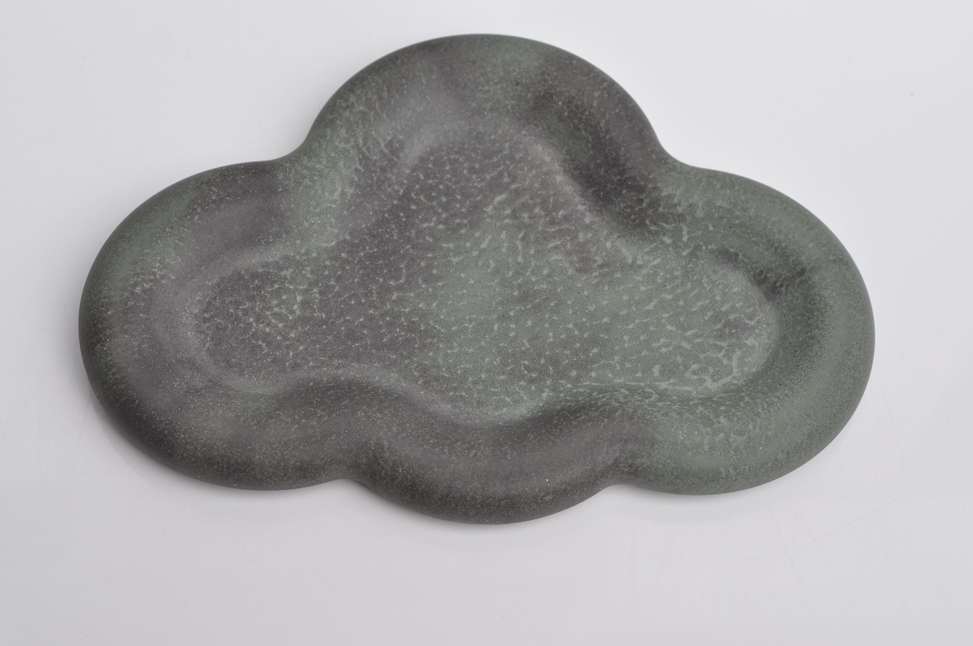 Contemporary concrete tray styled with décor items