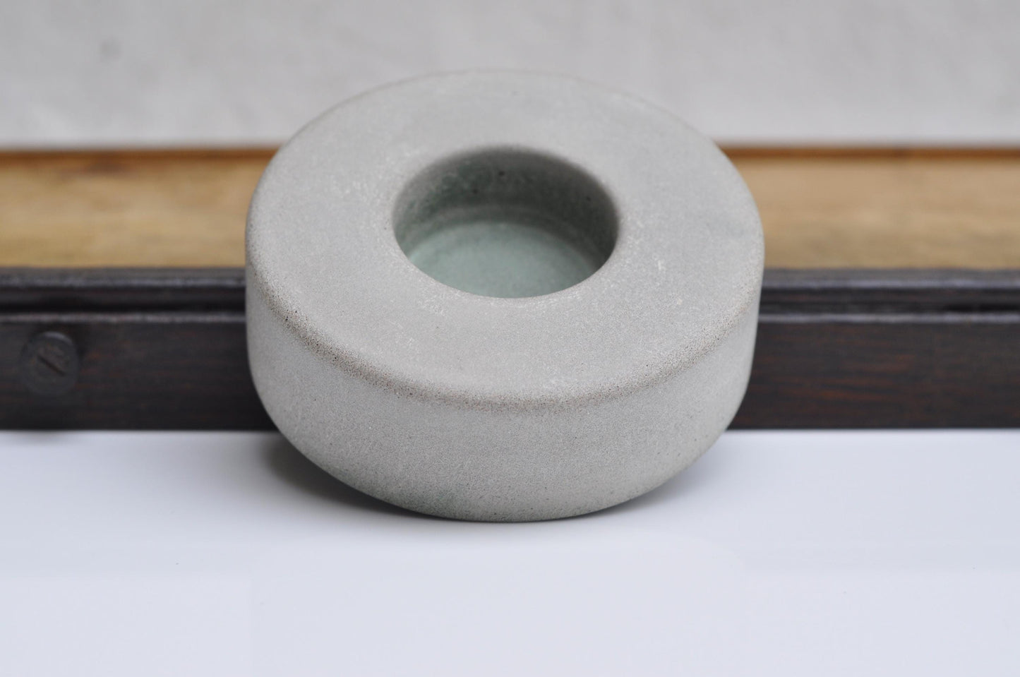 Small brutalist tealight holder made of concrete
