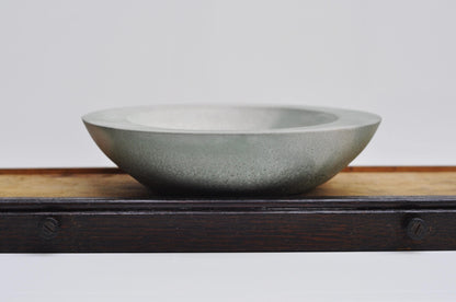 Textured handmade concrete plate with unique shape