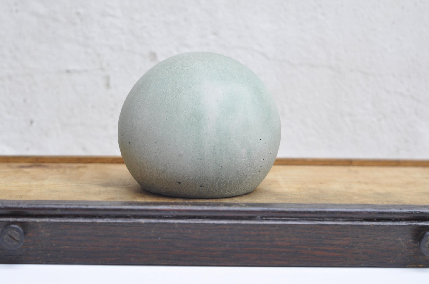 Heavy handmade concrete paperweight
