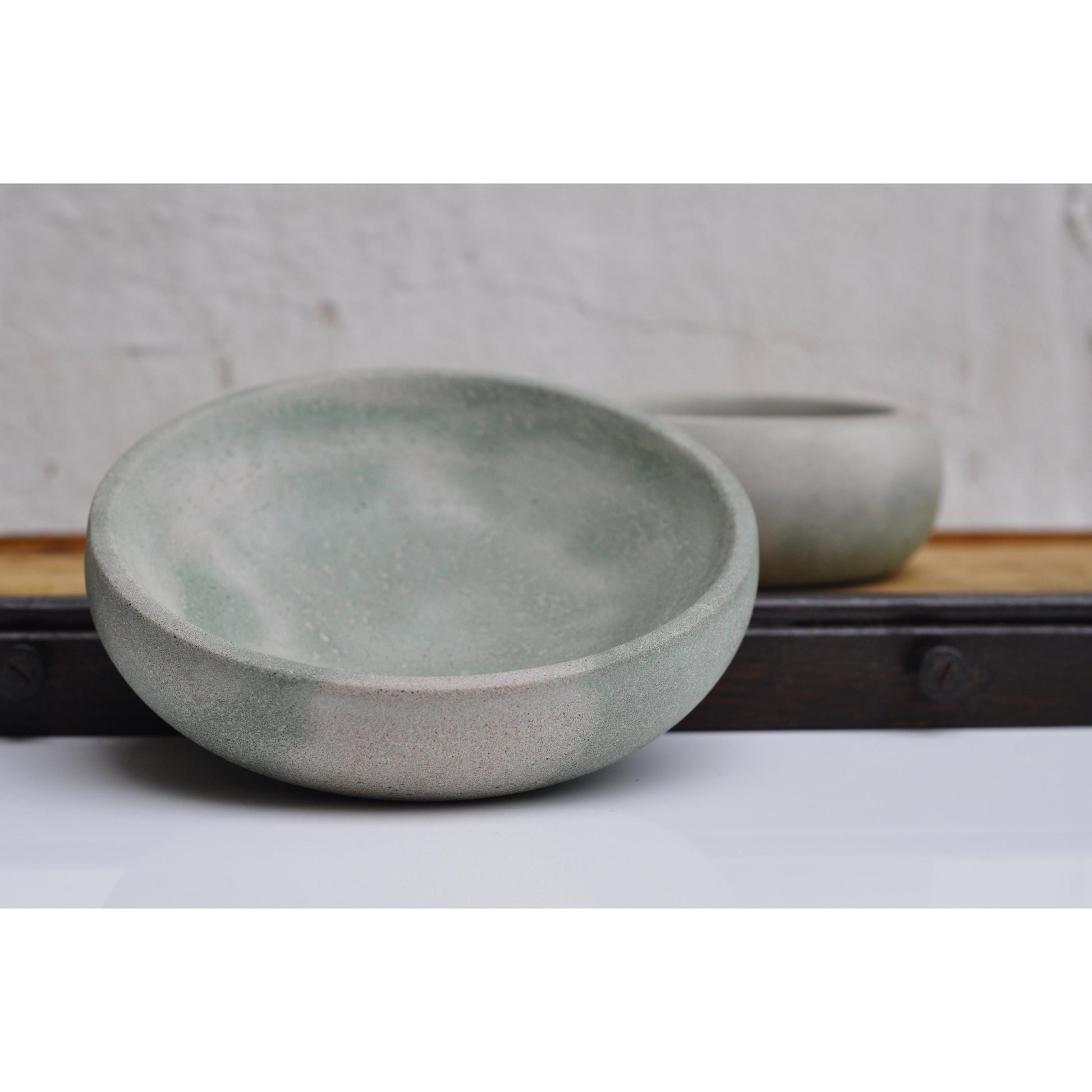 Handmade concrete bowl in light grey and green