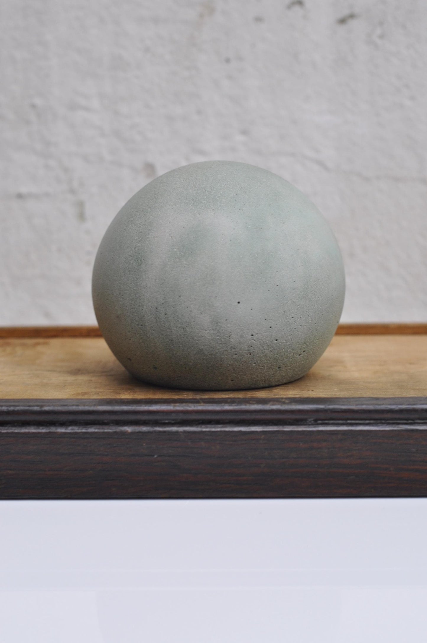 Handmade spherical concrete ornament