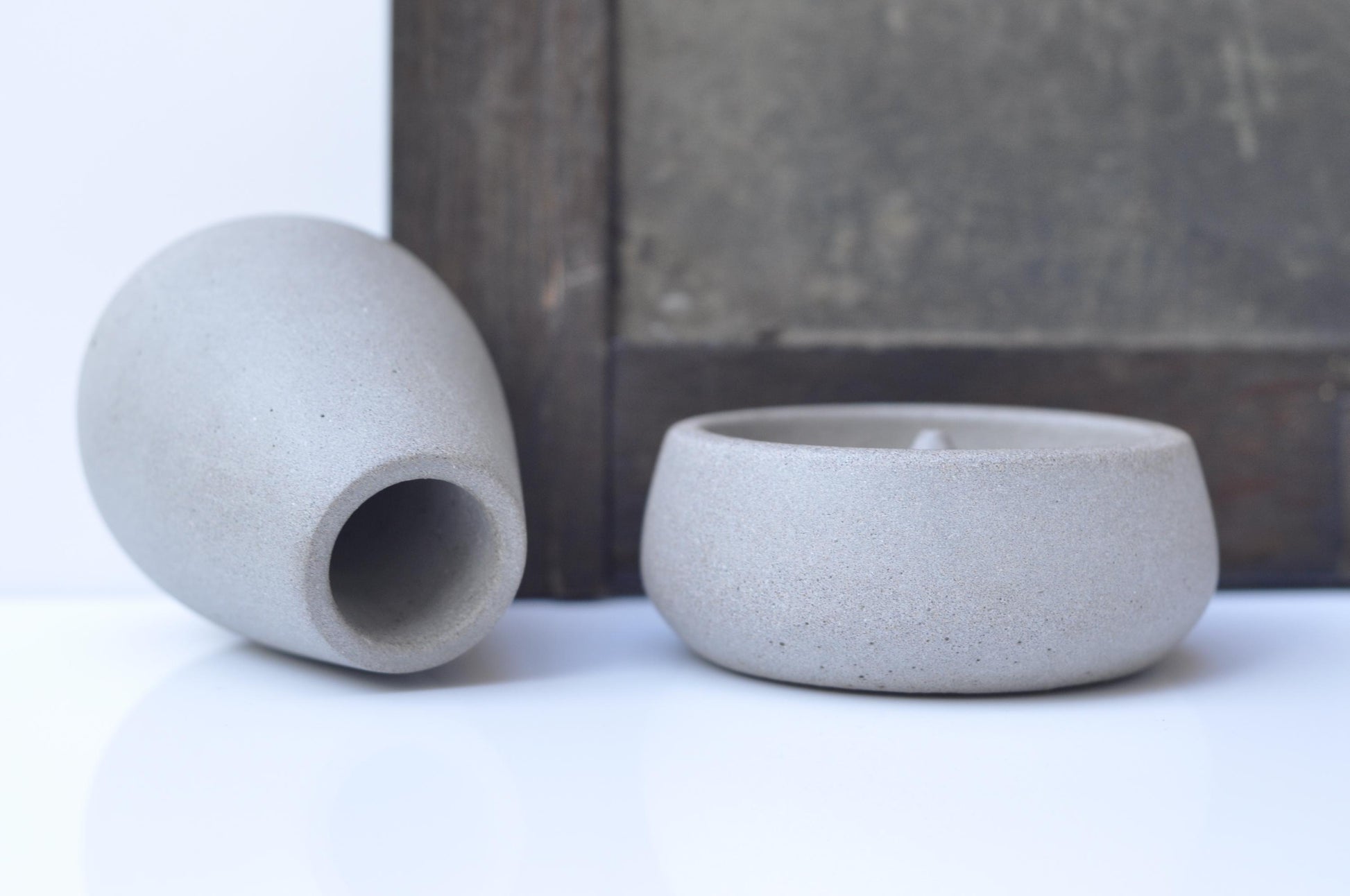 Concrete incense burner set displayed at home