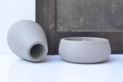Concrete incense burner set displayed at home
