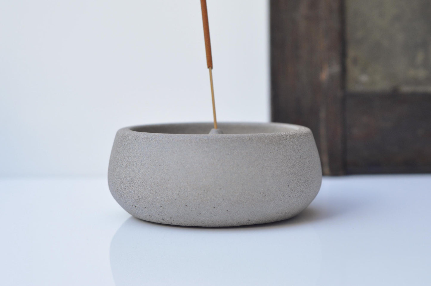 Handmade grey concrete incense holder
