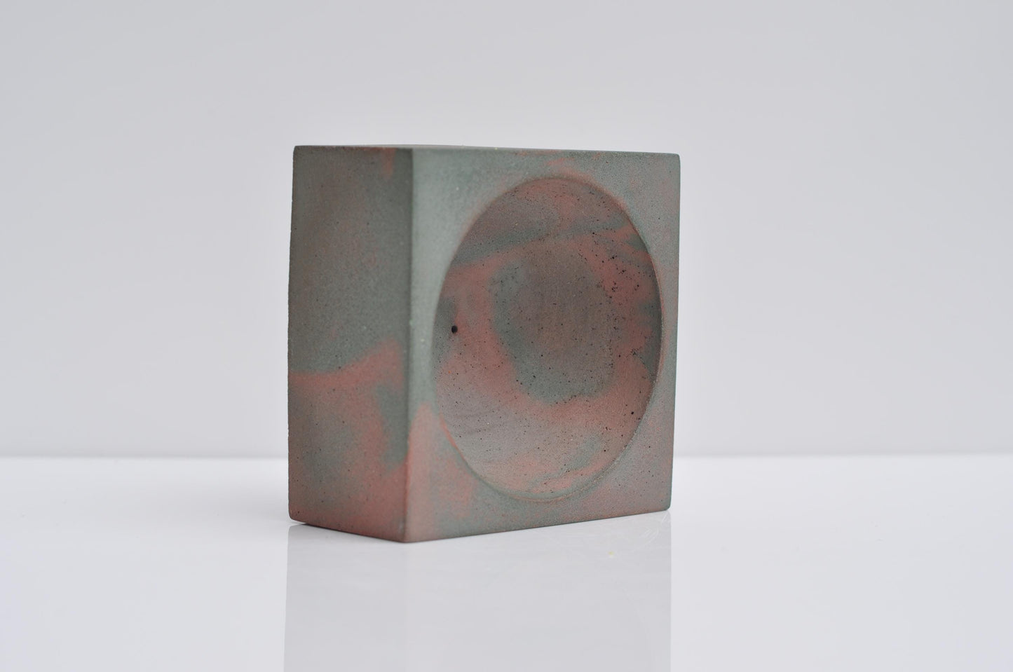 Studio shot of handmade concrete incense burner