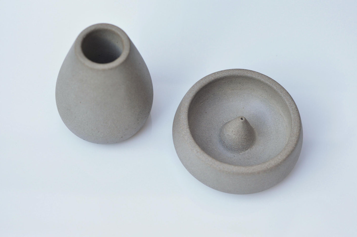 Top view of grey concrete incense burner