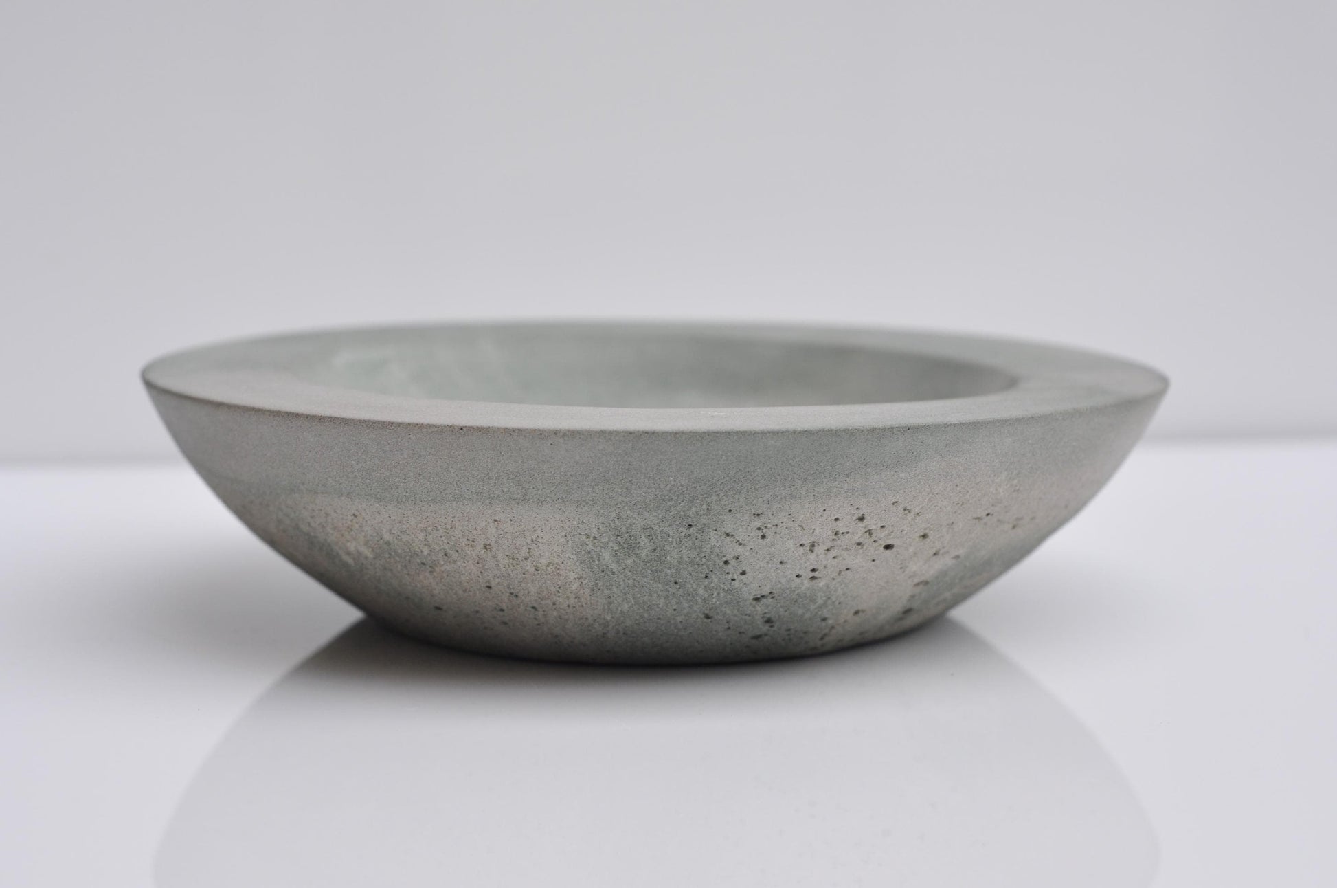 Compact concrete plate styled for home decor