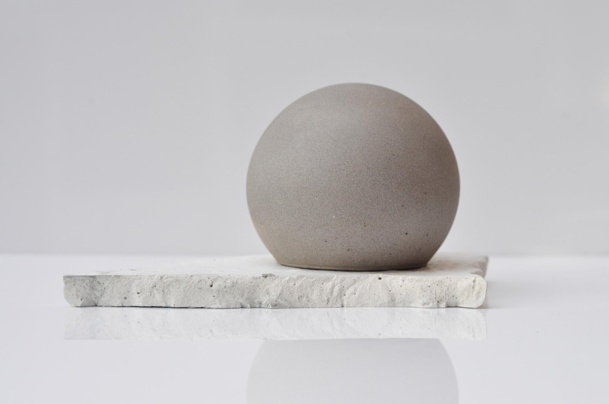Handmade modern round concrete ornament for shelf decor
