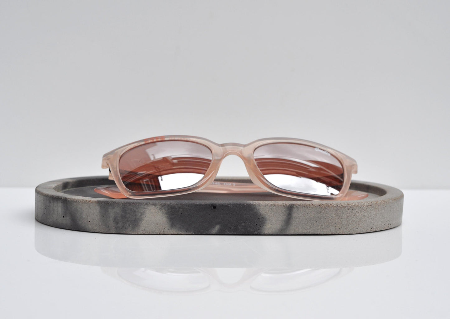 Handmade concrete tray in living room setting