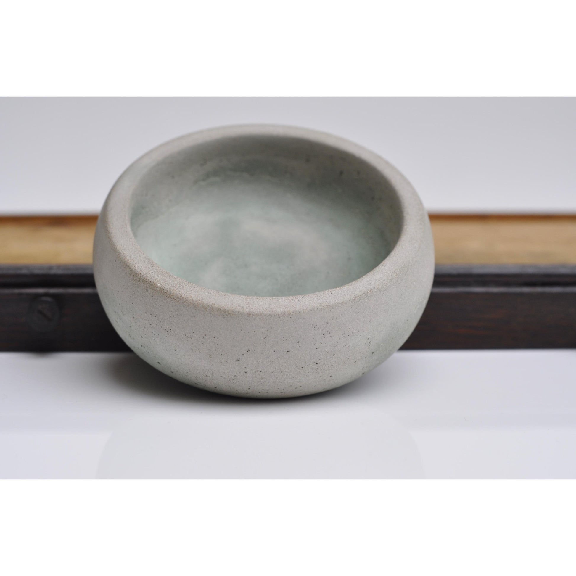 Handmade concrete trinket dish in light grey and green
