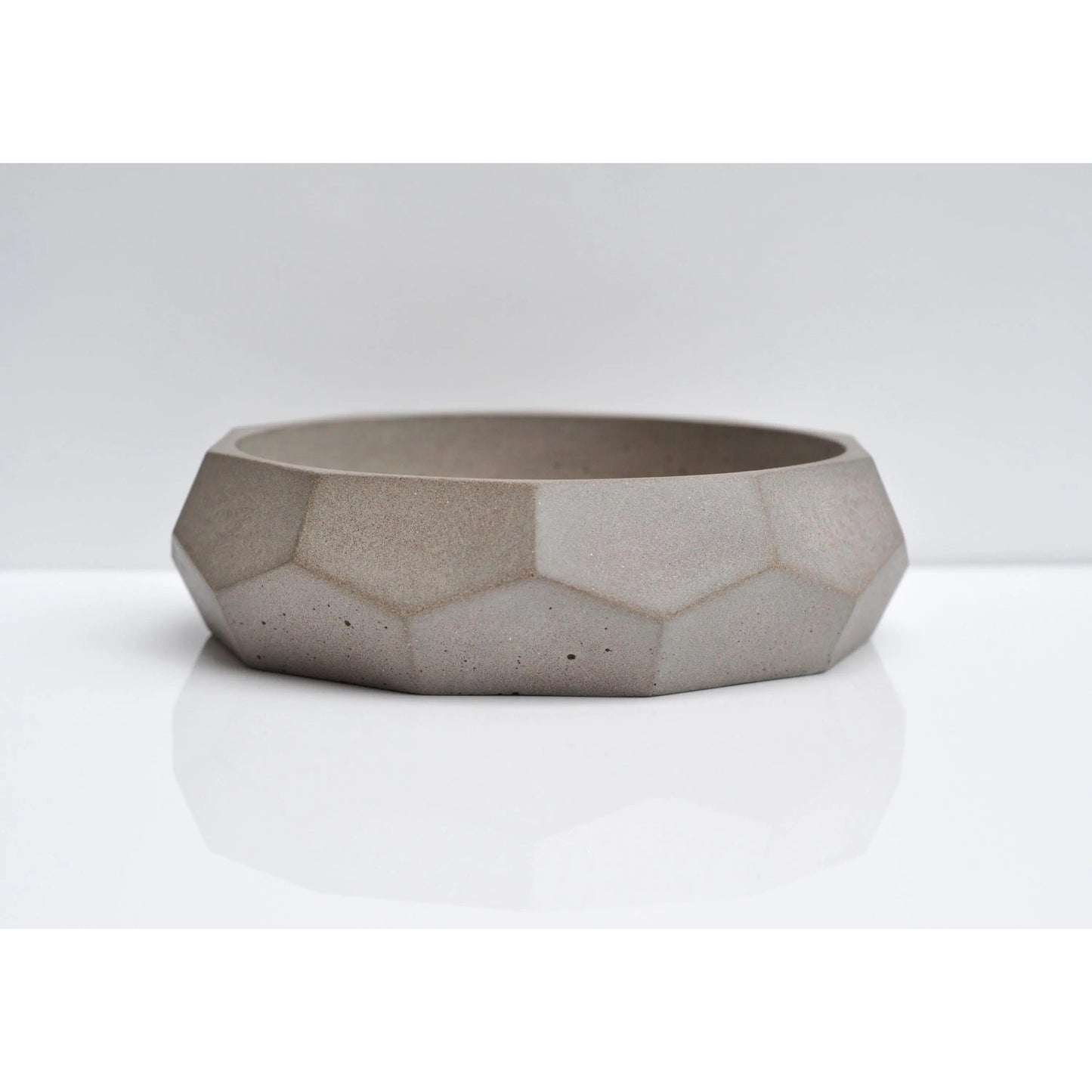 Side view of handmade diamond concrete bowl