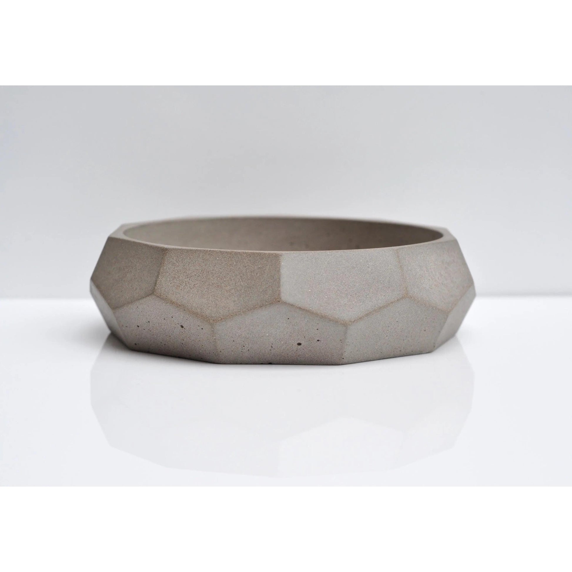 Side view of handmade diamond concrete bowl