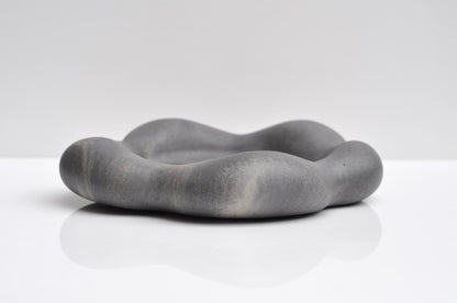 Close-up of textured handmade concrete tray