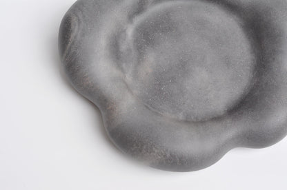 Close-up of textured handmade concrete tray