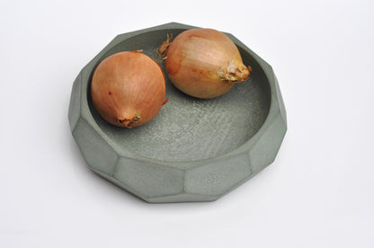 Contemporary green-grey concrete bowl for styling