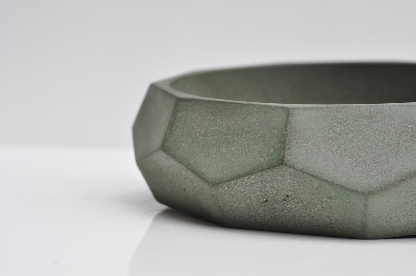 Minimalist cement bowl with faceted diamond design