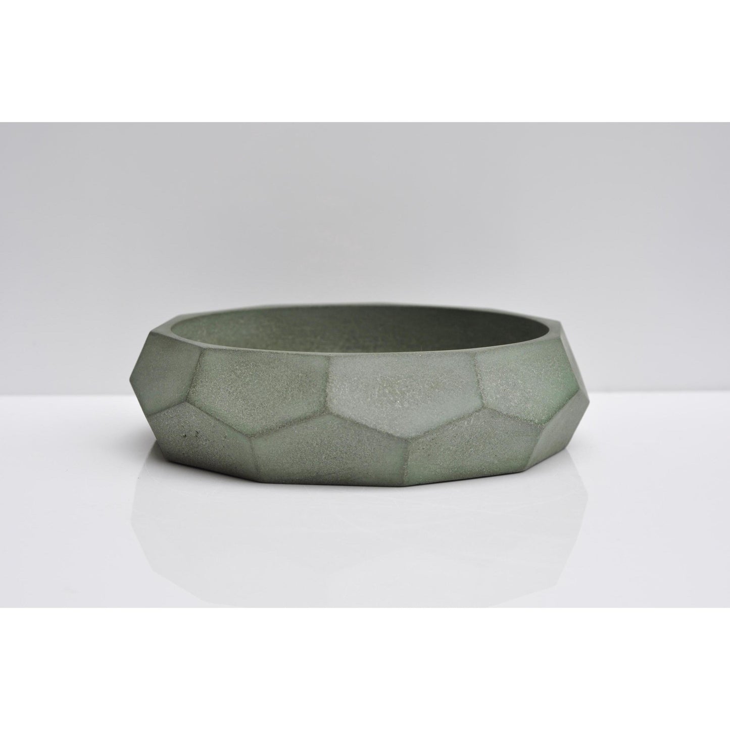Handmade green-grey concrete bowl with diamond shape