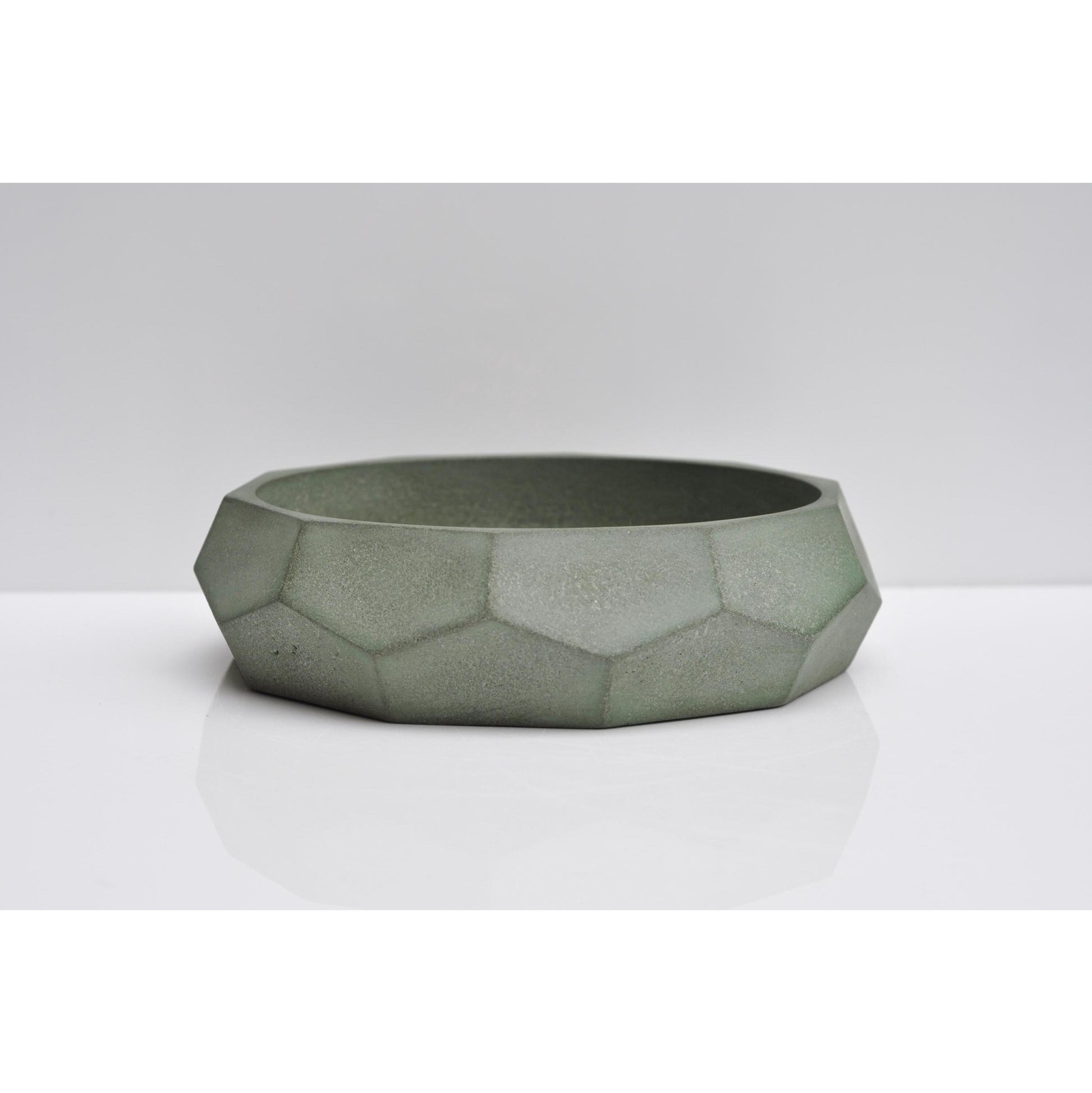 Handmade green-grey concrete bowl with diamond shape