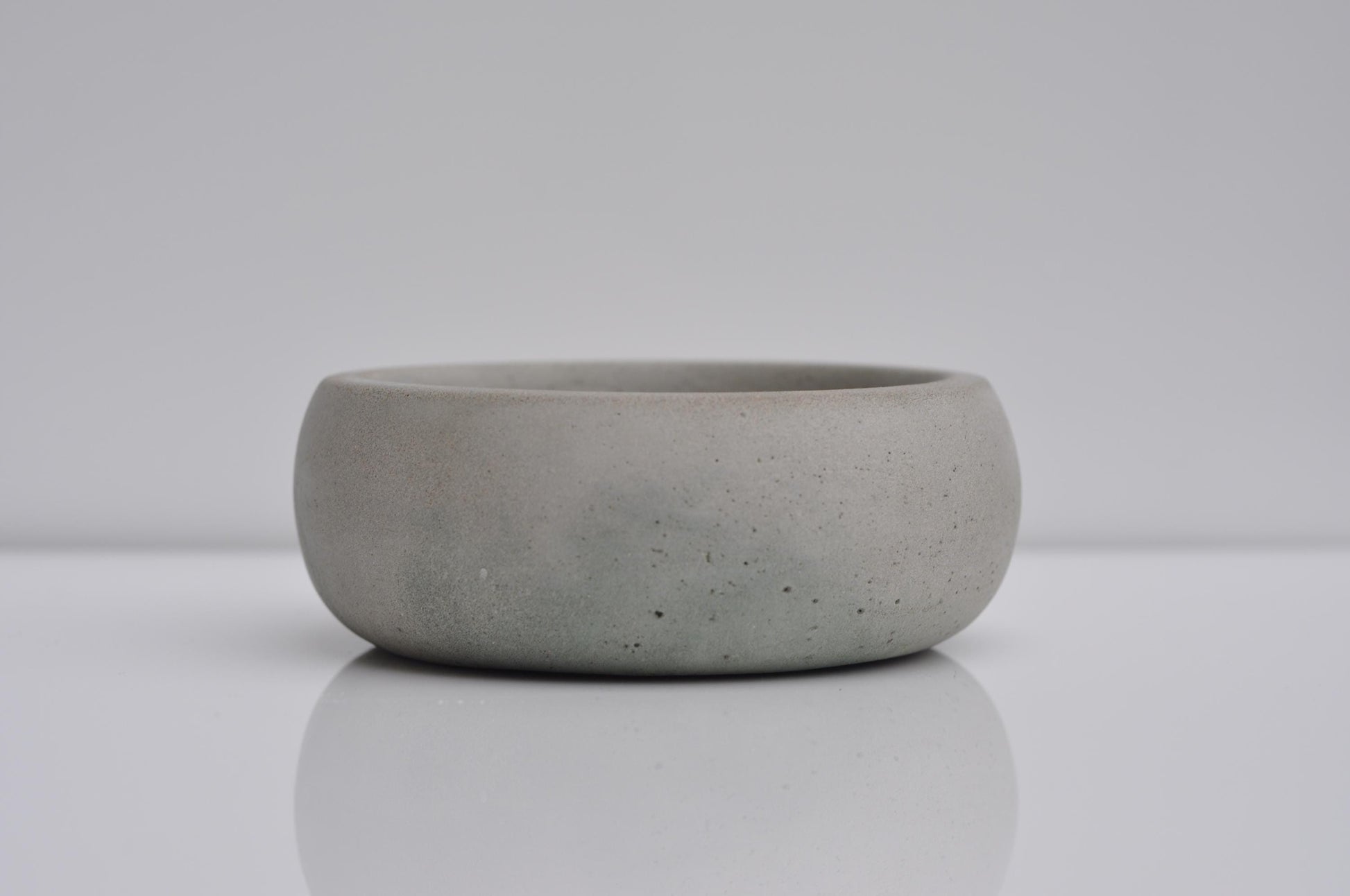 Little handmade concrete dish with rustic texture