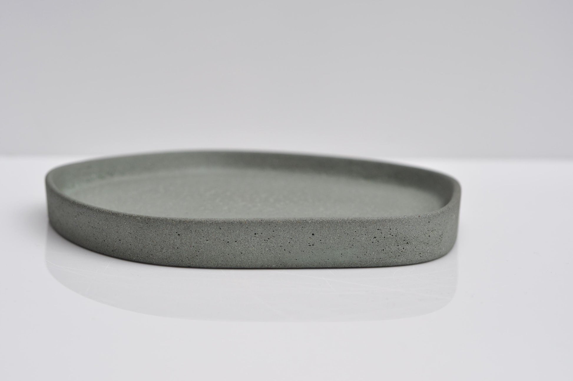 Contemporary green-grey concrete catchall bowl