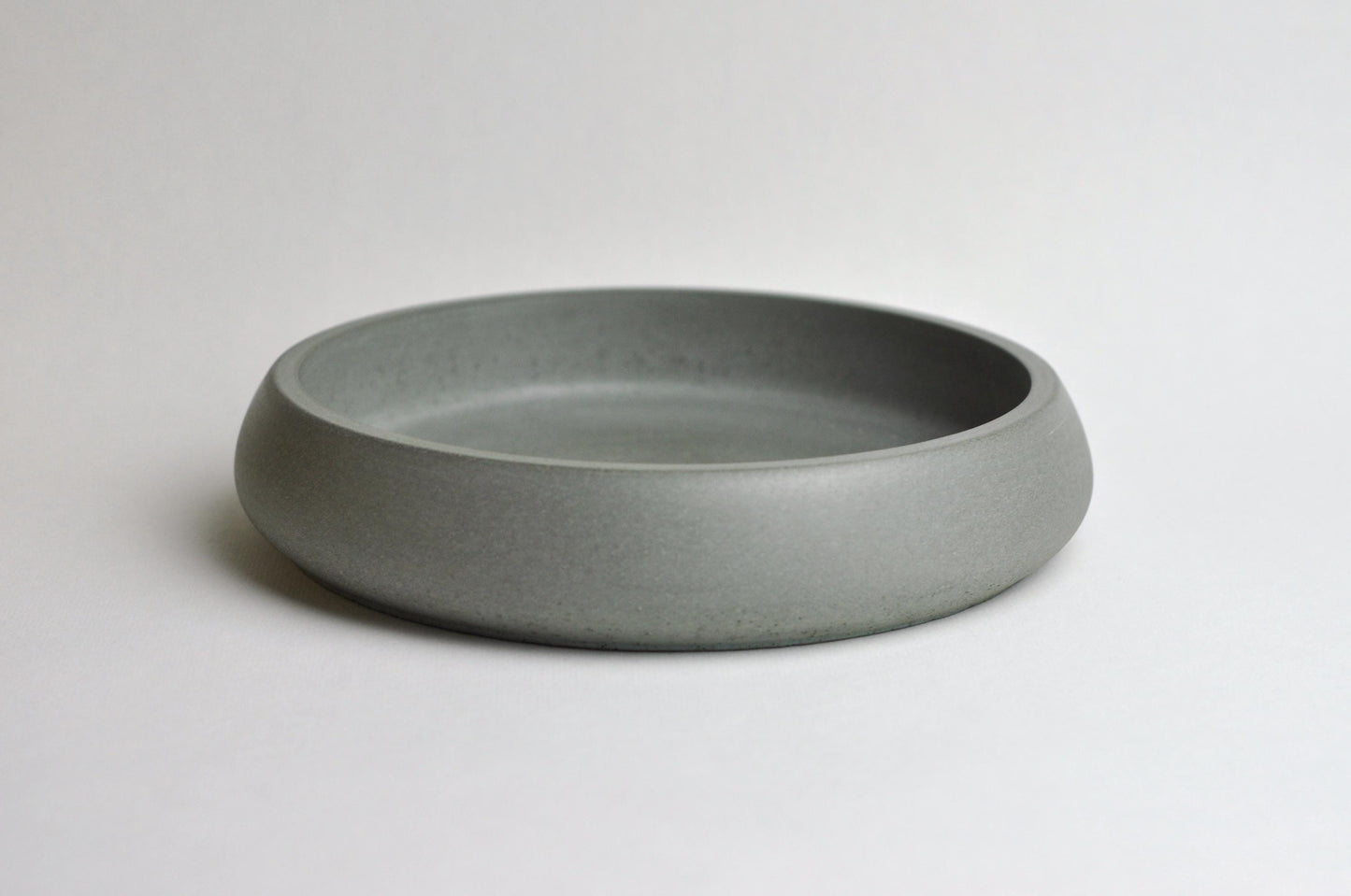 Grey concrete bowl as functional home décor