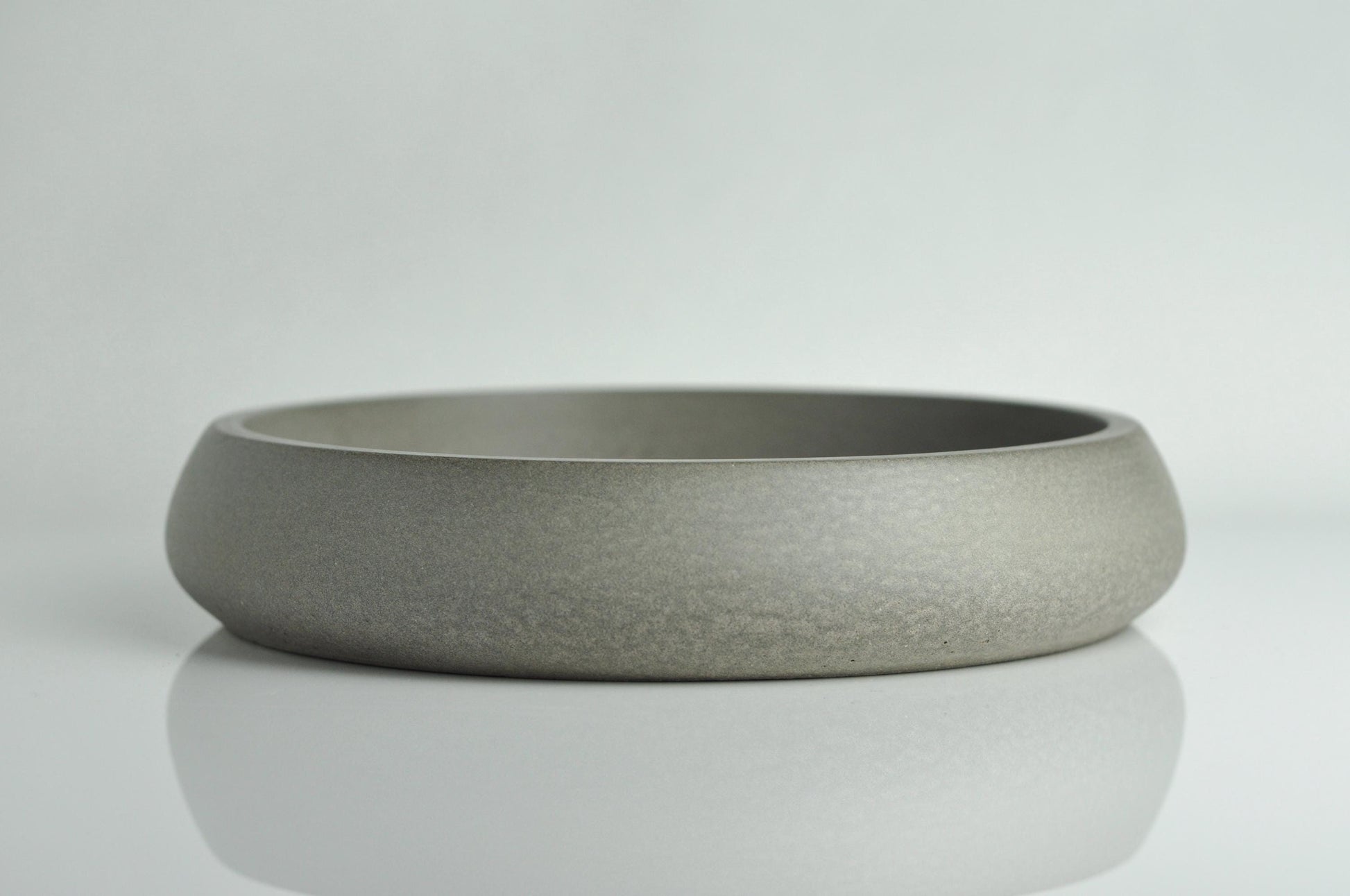 Handmade cement décor bowl in neutral setting