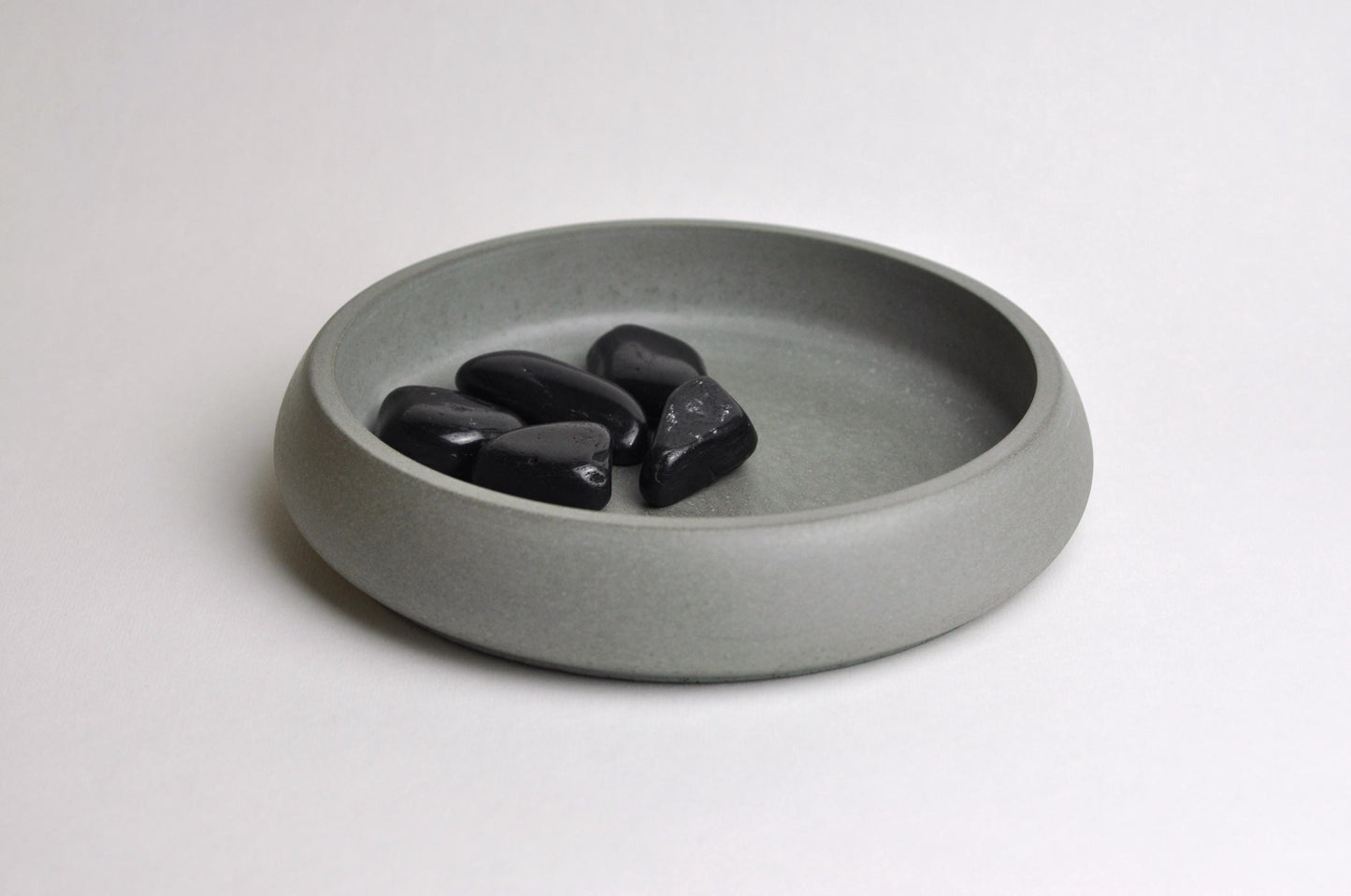 Grey concrete bowl as functional home décor