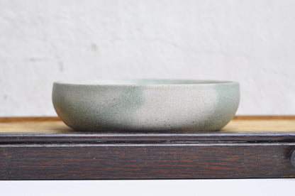 Light grey and green cement bowl for accessories