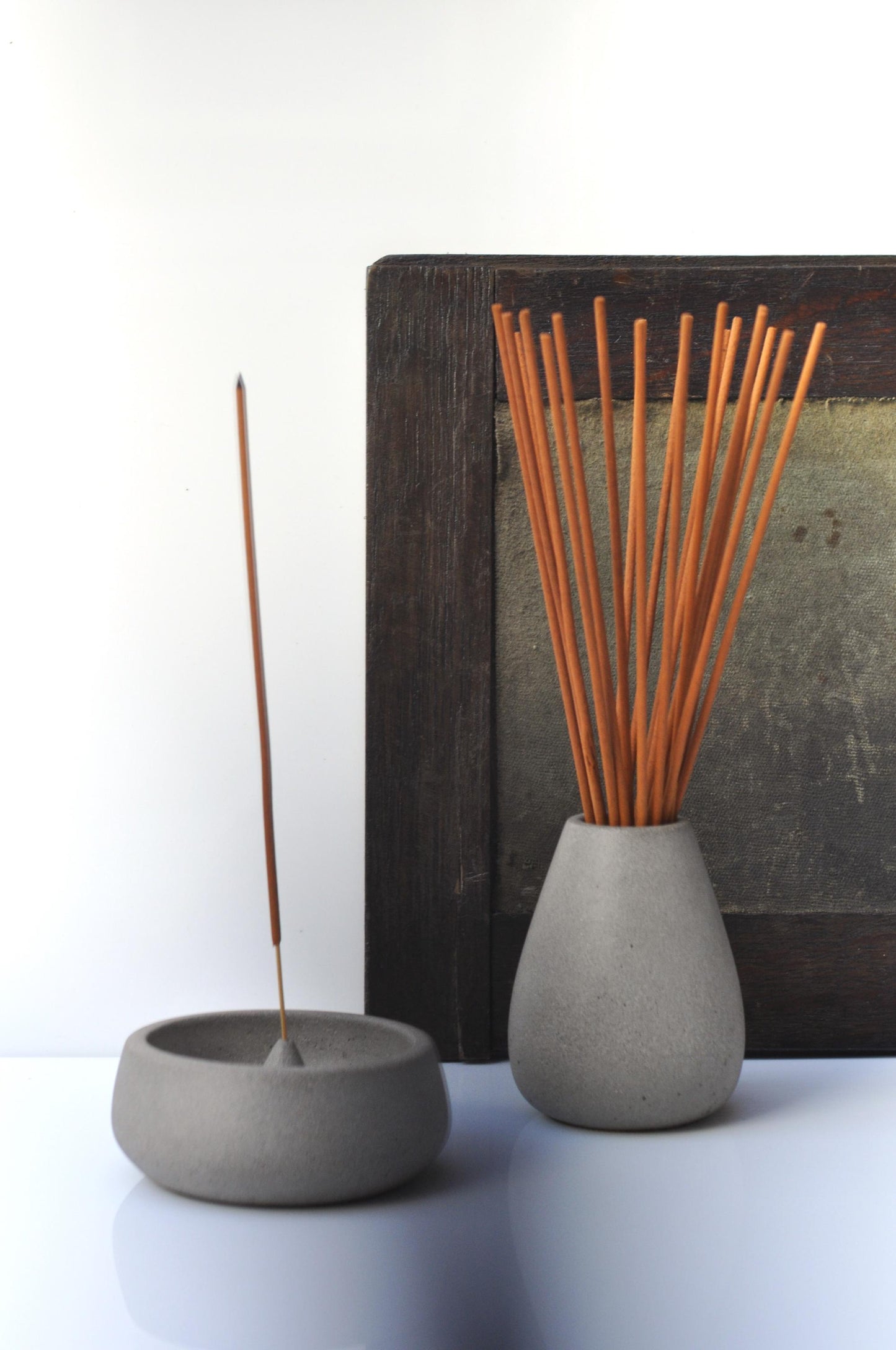 Handmade cement joss stick holder in grey