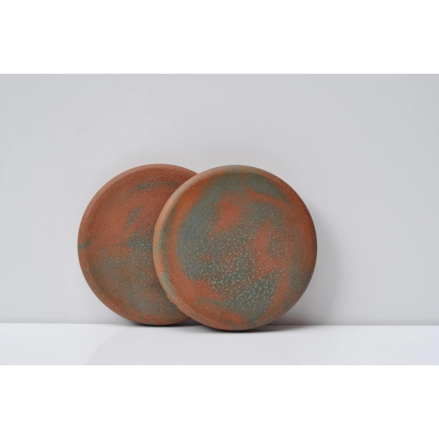 Handmade concrete coasters set of 2 in orange and green