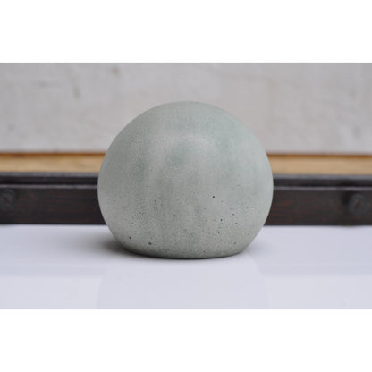 Minimalist concrete paperweight ball