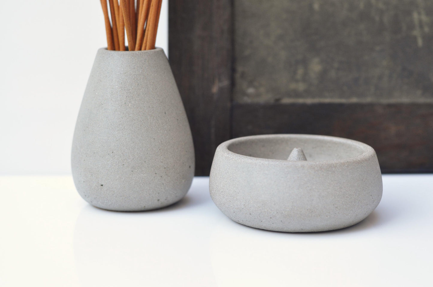 Handmade grey concrete incense holder