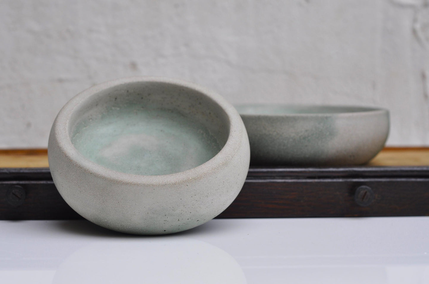 Small rustic concrete coin bowl