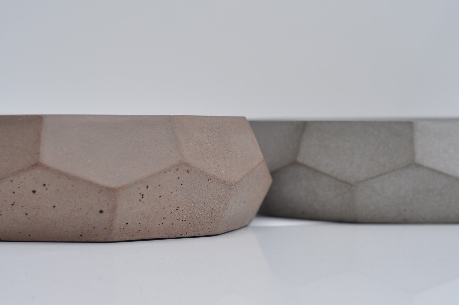 Grey and brown concrete fruit bowls 