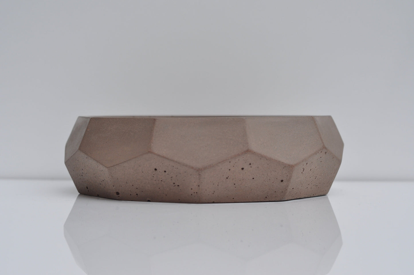 Beige concrete fruit bowl 