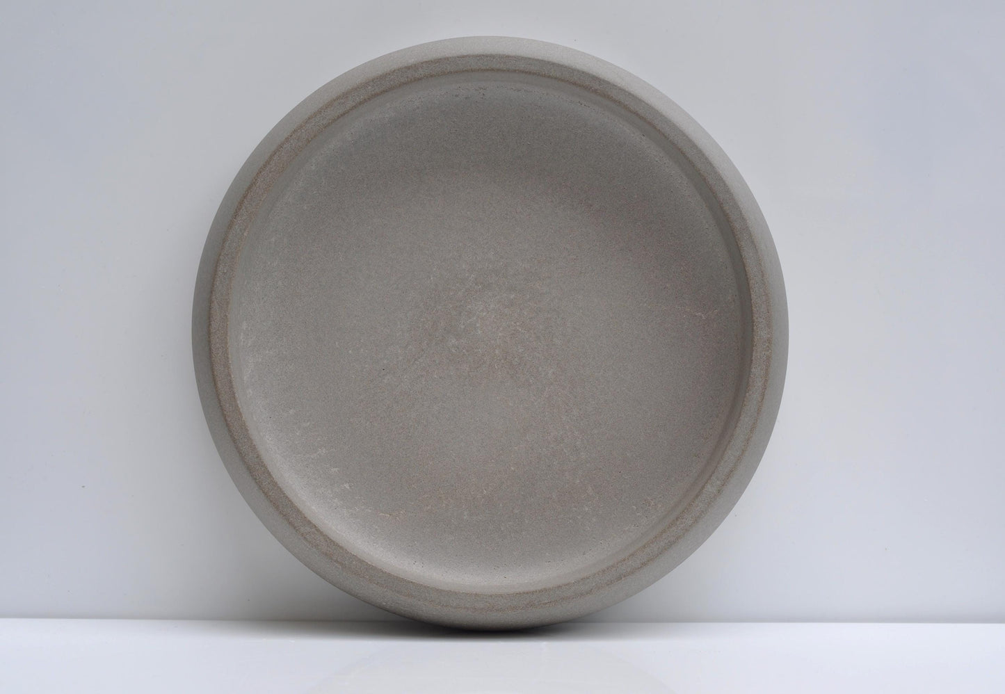 Top view of empty large concrete fruit bowl