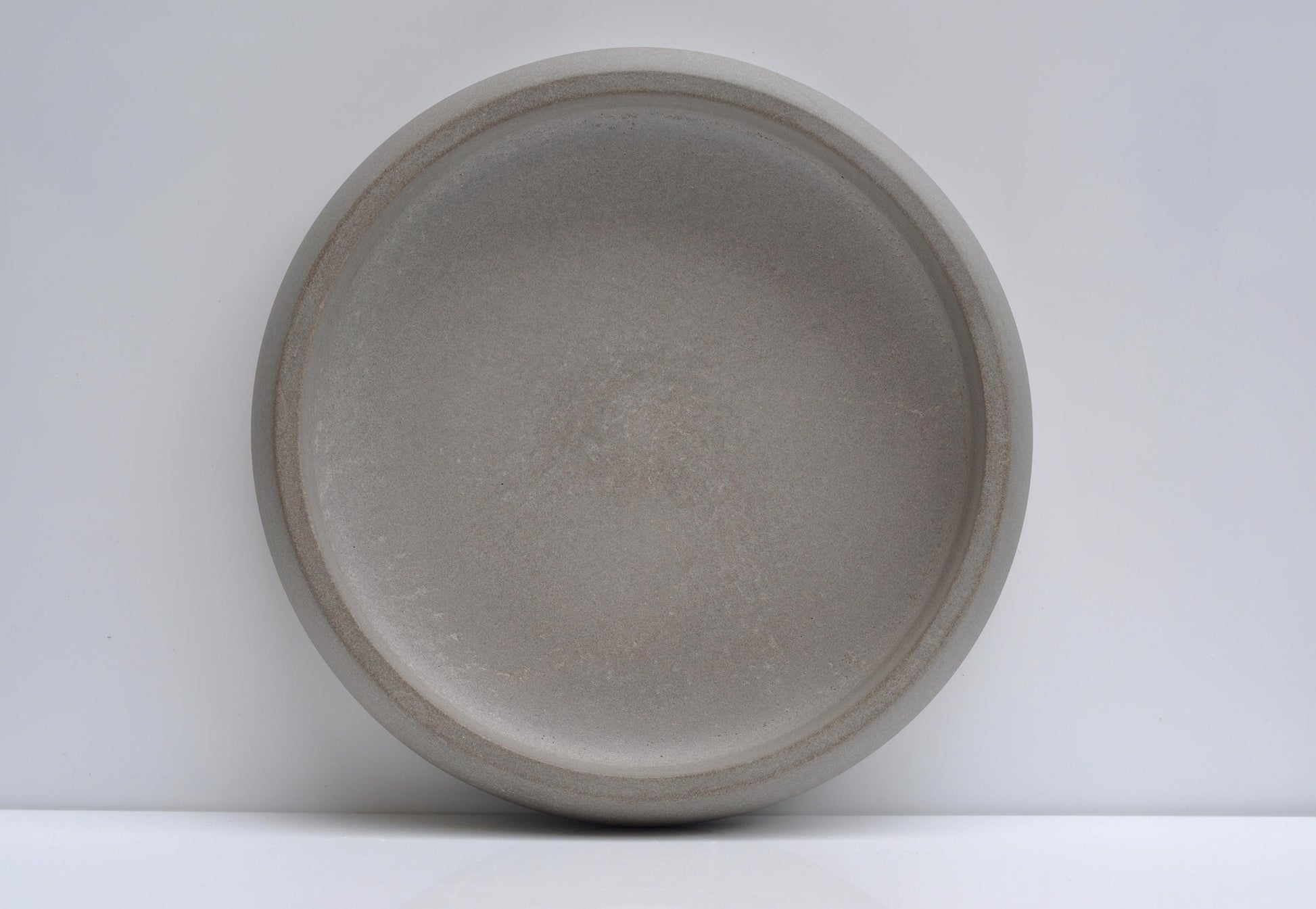 Top view of empty large concrete fruit bowl