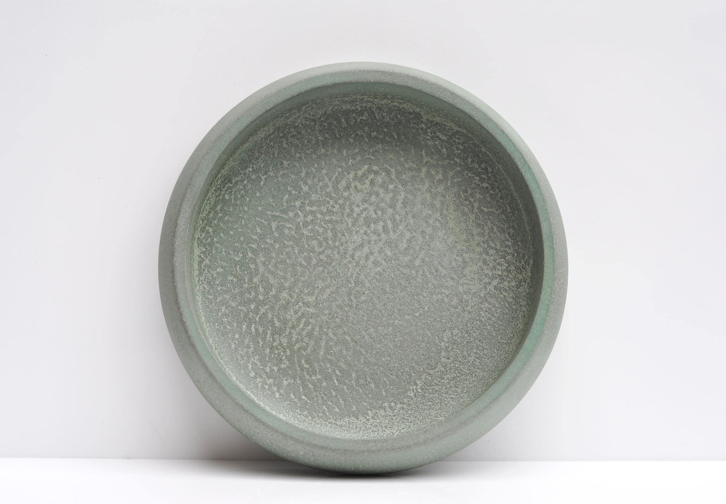 Close-up of textured green concrete surface