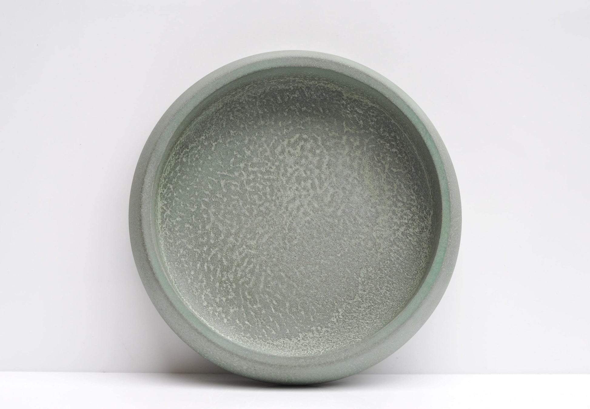 Close-up of textured green concrete surface