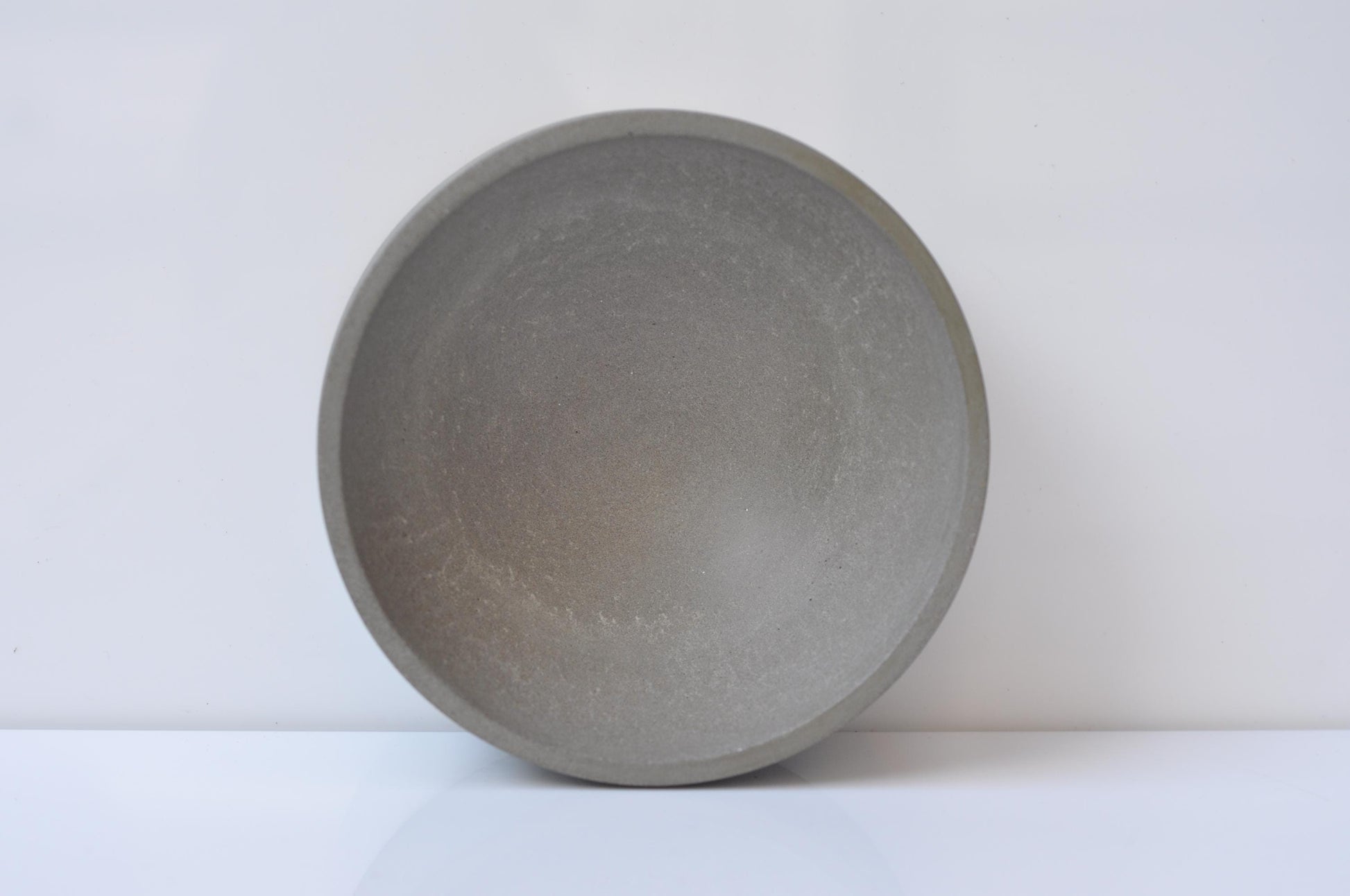 Smooth grey concrete bowl for home decor