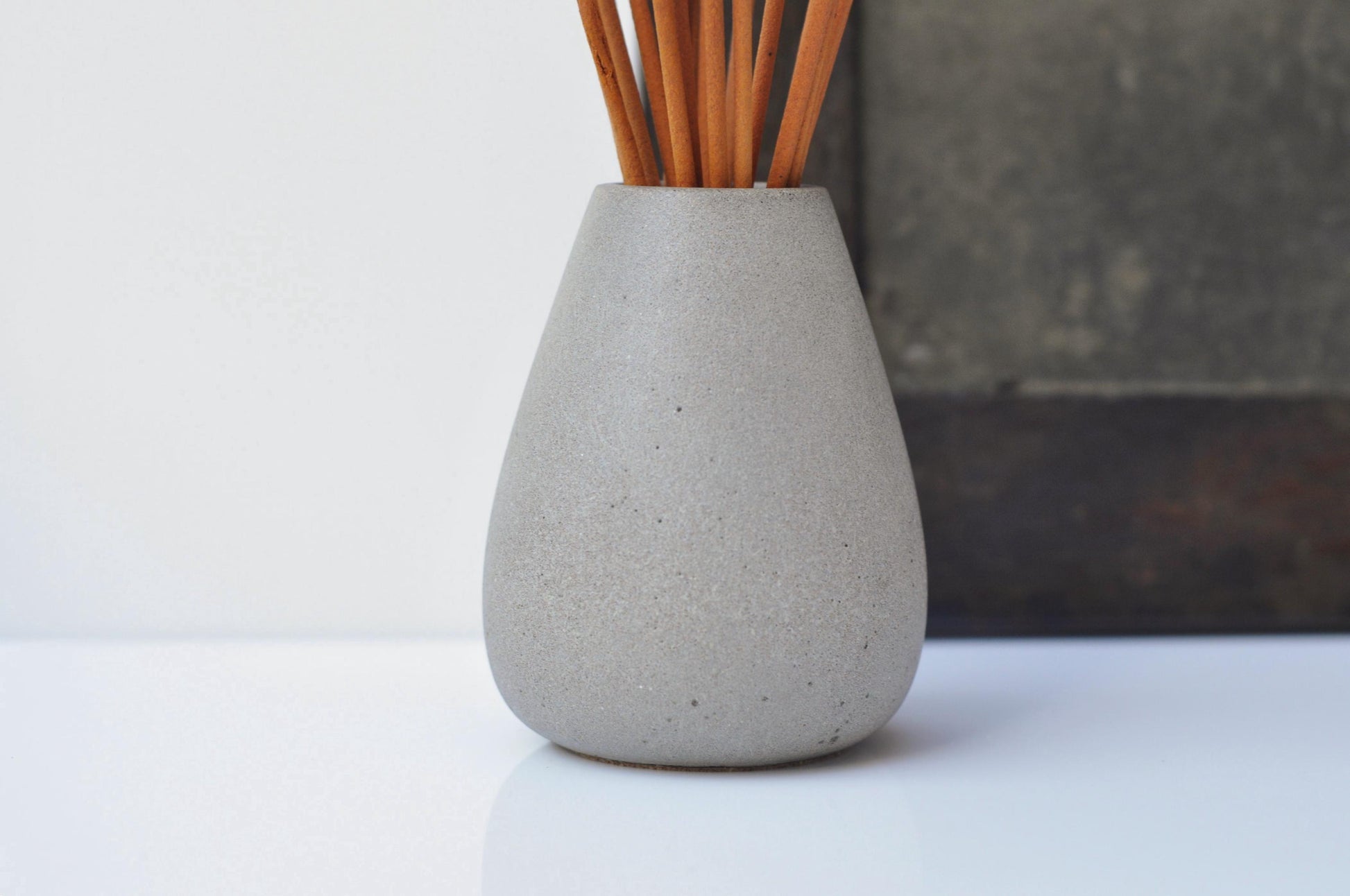 Cement joss stick holder set in grey