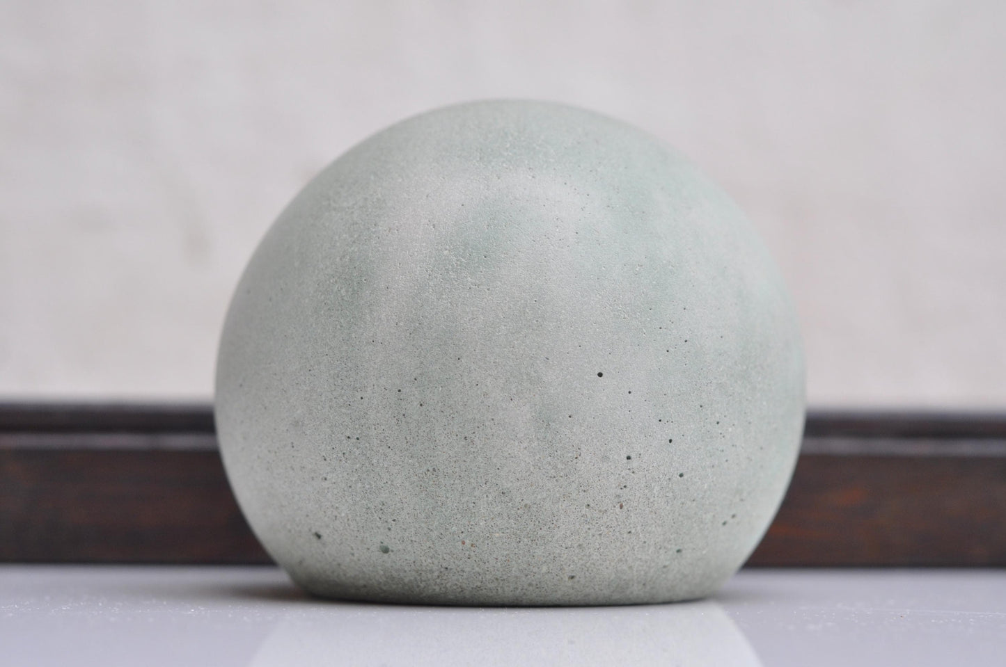 Smooth cement sphere for minimalist decor